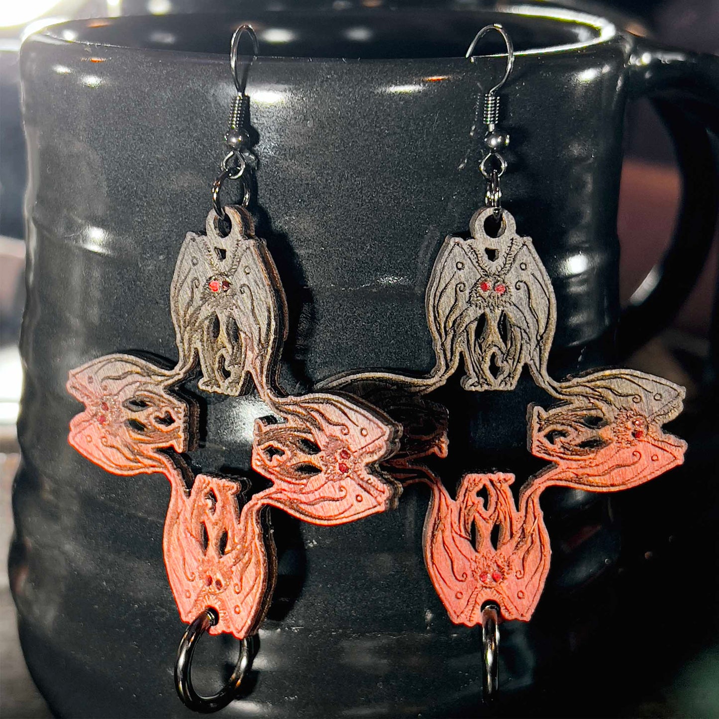 Mothman Earrings Black to Red Cryptid Cross with Gunmetal Ring