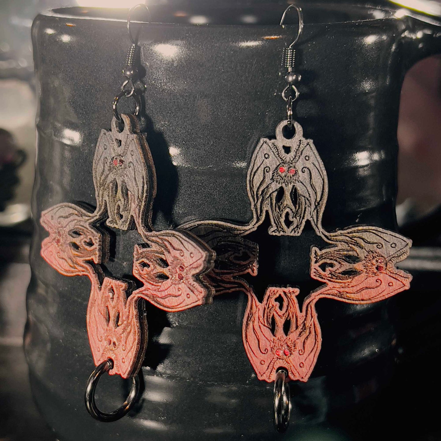 Mothman Earrings Black to Red Cryptid Cross with Gunmetal Ring