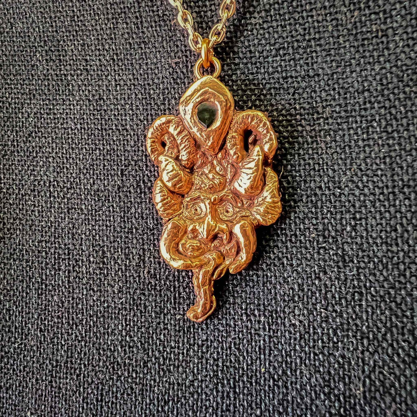 handmade; krampus jewelry; krampus pendant; copper; stone set;