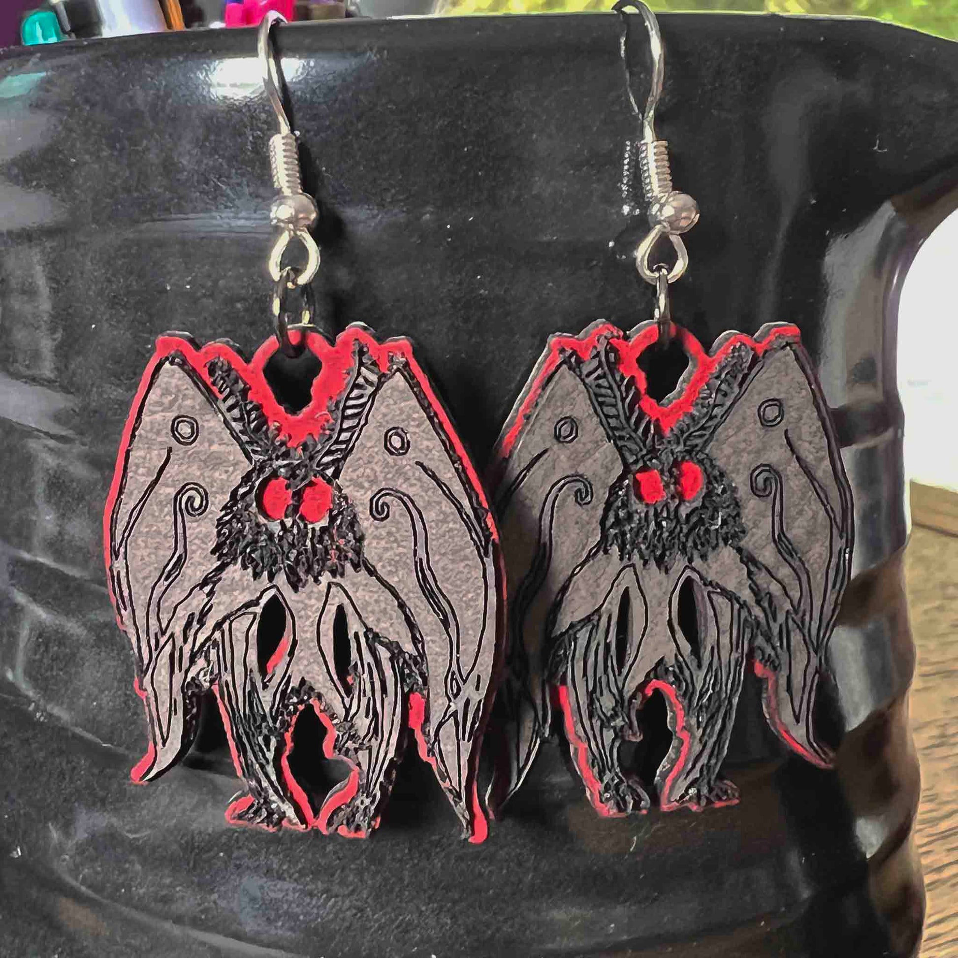 Mothman Cryptid Earrings in Slate and Red; drop earrings; handmade; mothman earrings; mothman jewelry; Melasdesign; small business; Cryptid Collection; cryptid jewelry