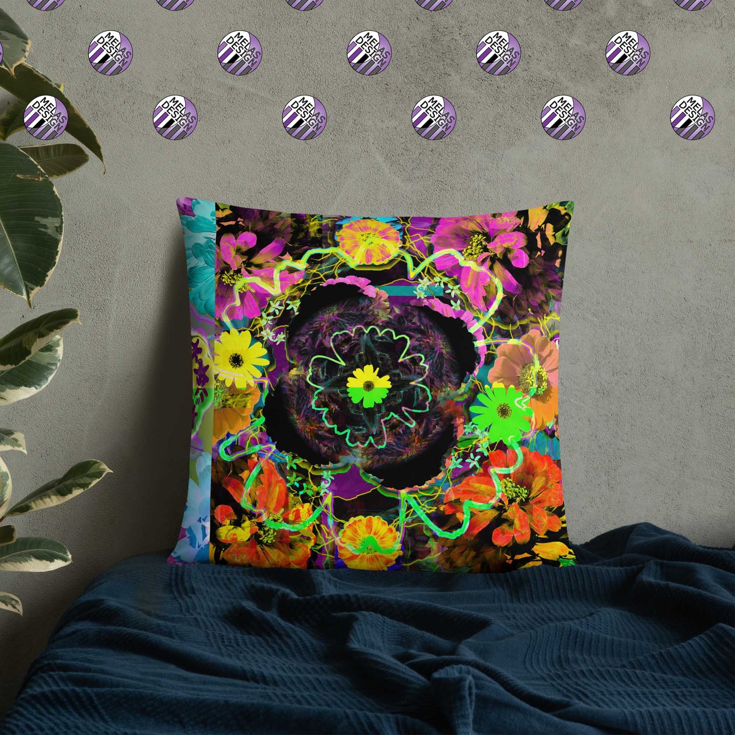 Color Joy Flower Power Throw Pillow v3; 22x22; product mock-up on bed with plant and Melasdesign logos