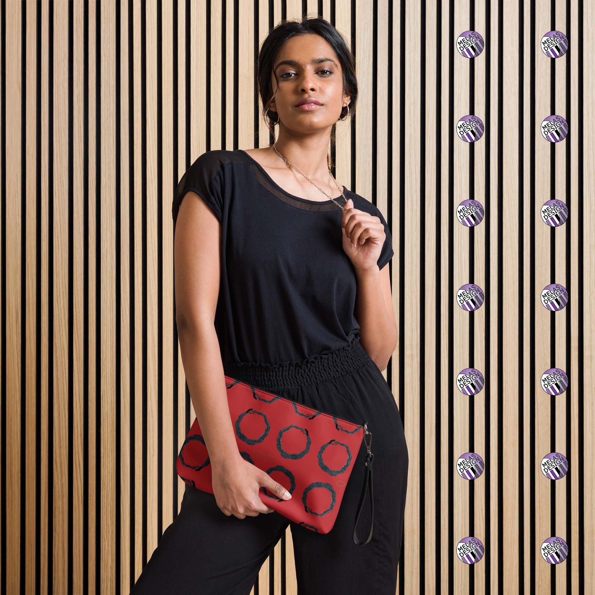 Ouroboros Infinity Cross-Body Bag Red Black; Product mockup held by female model; Melasdesign logos