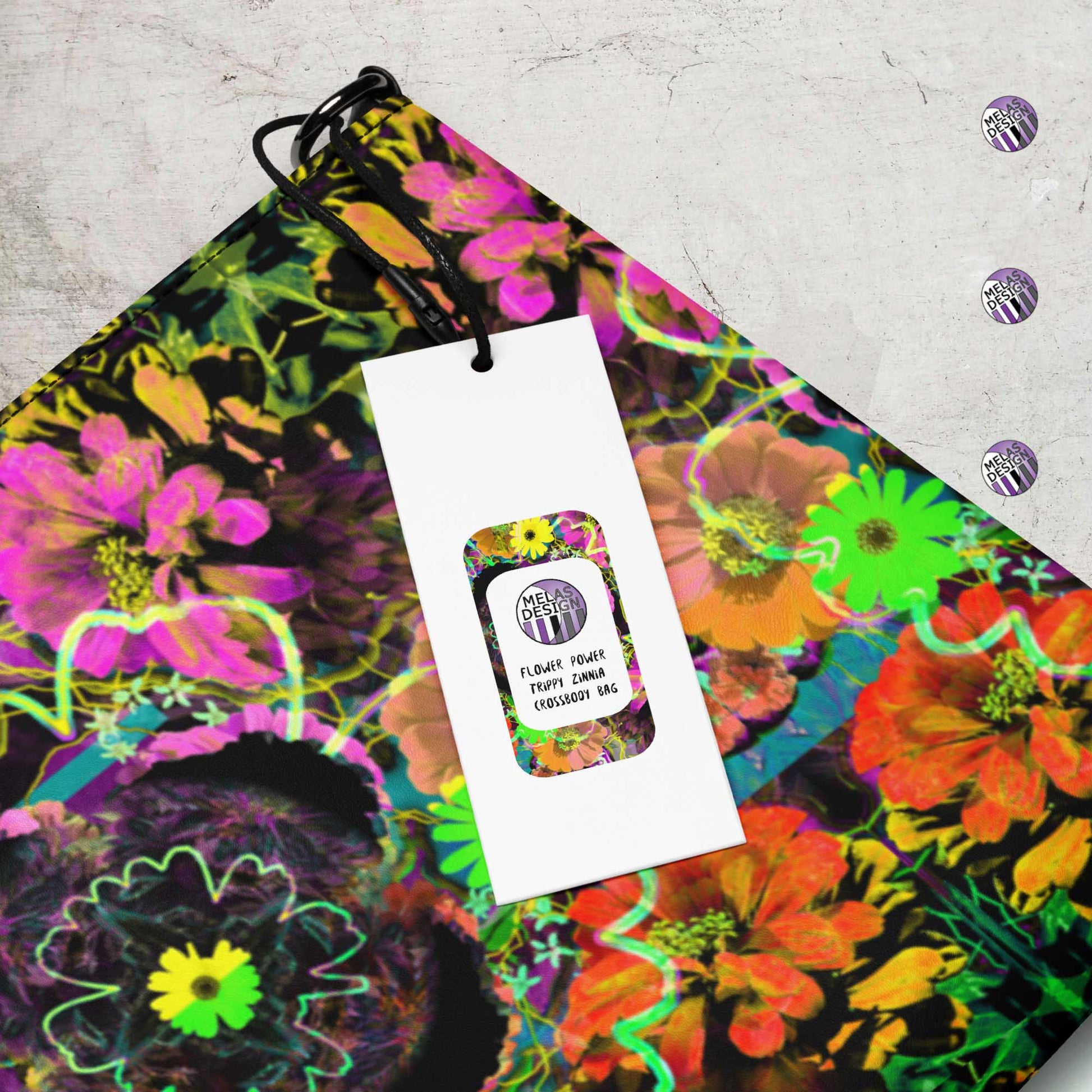 Flower Power; Trippy Zinnia Crossbody Bag; Product mockup tag detail; Melasdesign logos