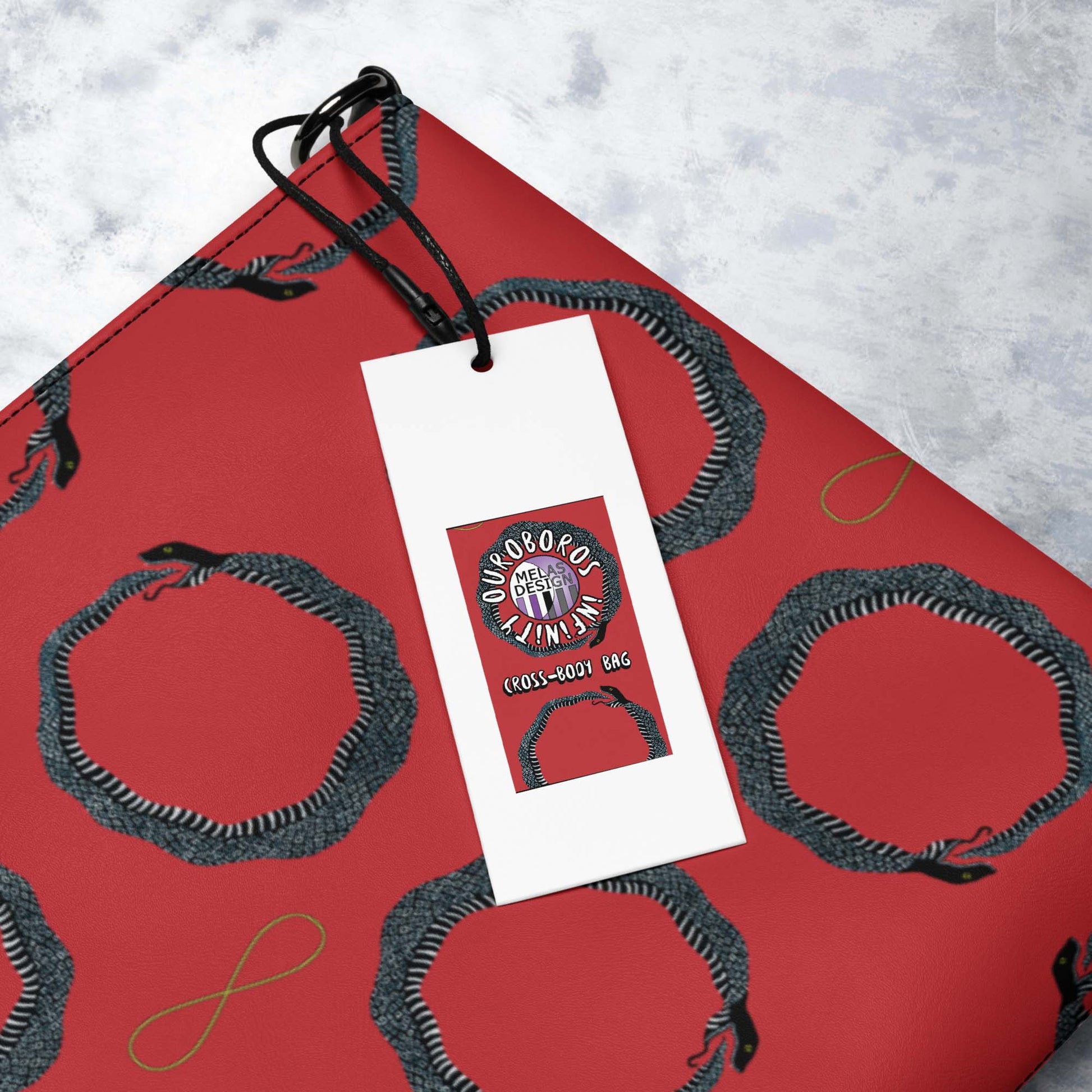 Ouroboros Infinity Cross-Body Bag Red Black; Product mockup label detail