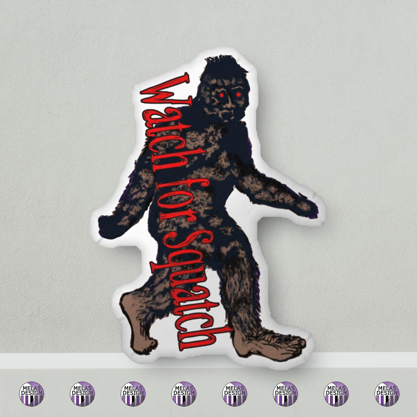 Watch for Squatch Shaped Pillow; Bigfoot Decor; Product mockup; 22" pillow mock up on grey and Melasdesign logos