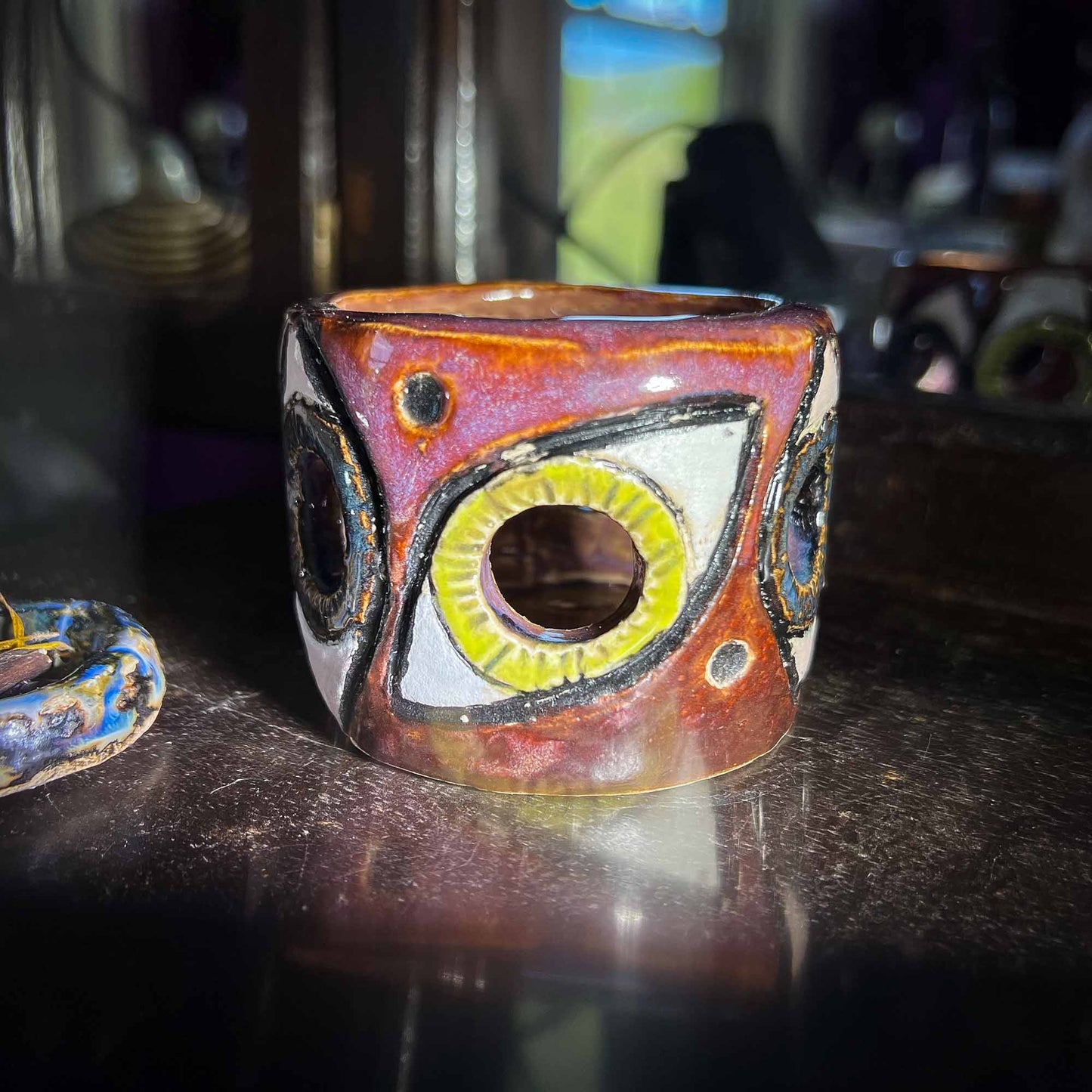 Melas Floating Eyes Ceramic Candle Holder