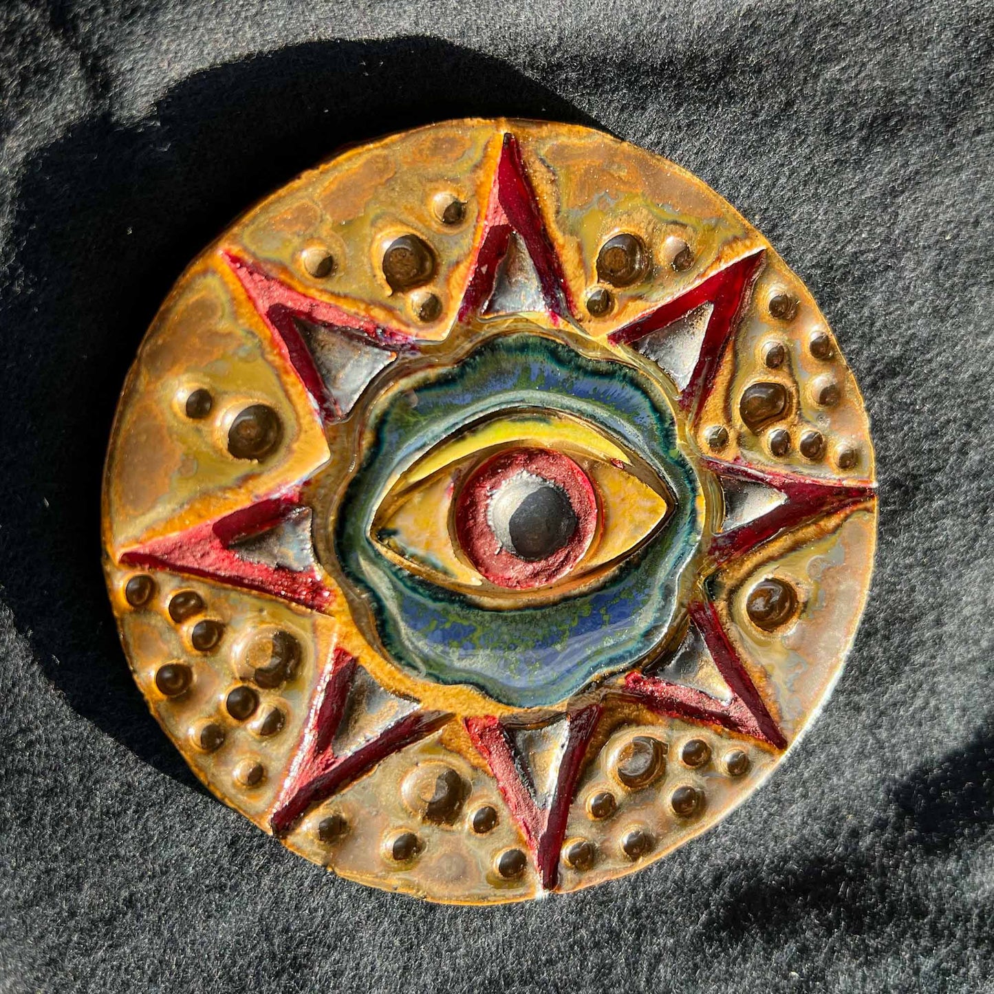 Melas Ceramic Red Eye Mandala Wall Art Earthy