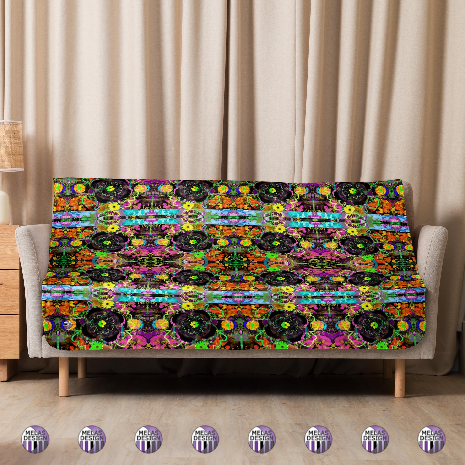 Color Joy Flower Power Sherpa Blanket v3; 50x60; product mock-up with blanket draped on couch and logos