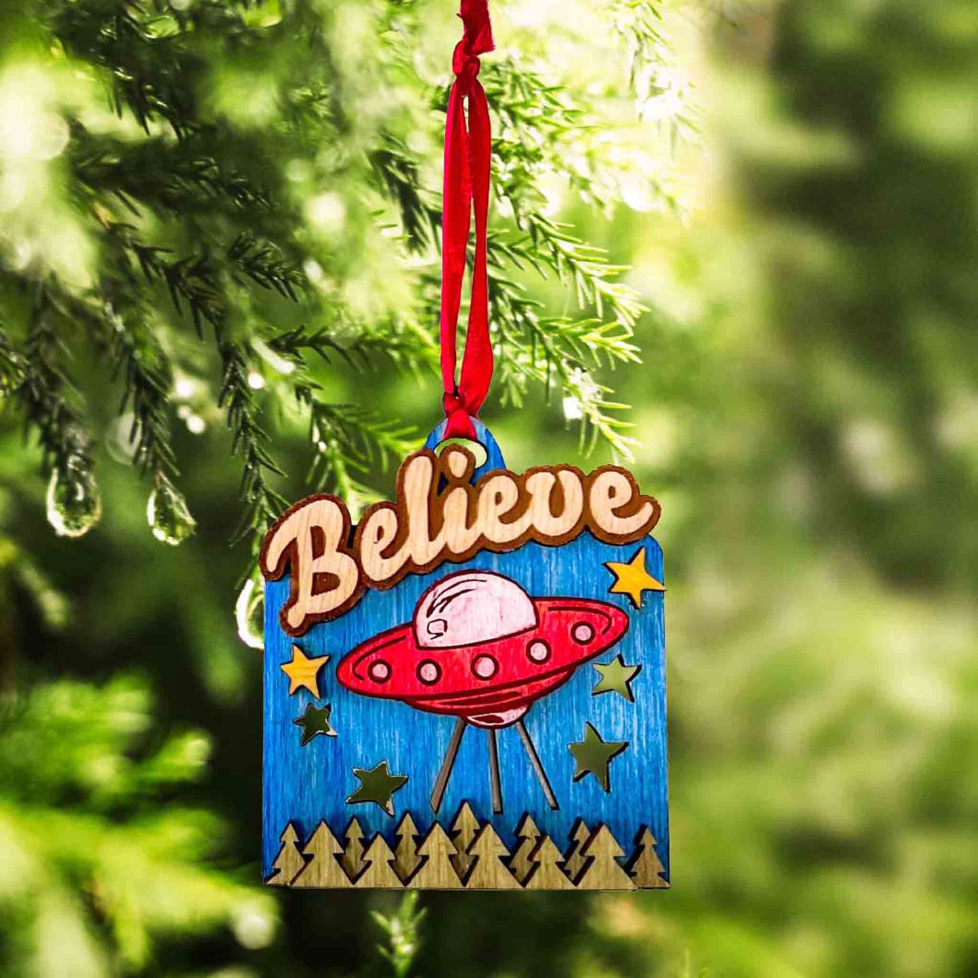 Believe UFO Holiday Hanging Decor Ornament; Believe UFO ornament; UFO ornament; alternative holiday decor; sci-fi gift; Cryptid Collection; Melasdesign Handmade Shop; believe holiday ornament; holiday hanging decor; funny christmas ornament; Melasdesign Handmade; Thomas WV