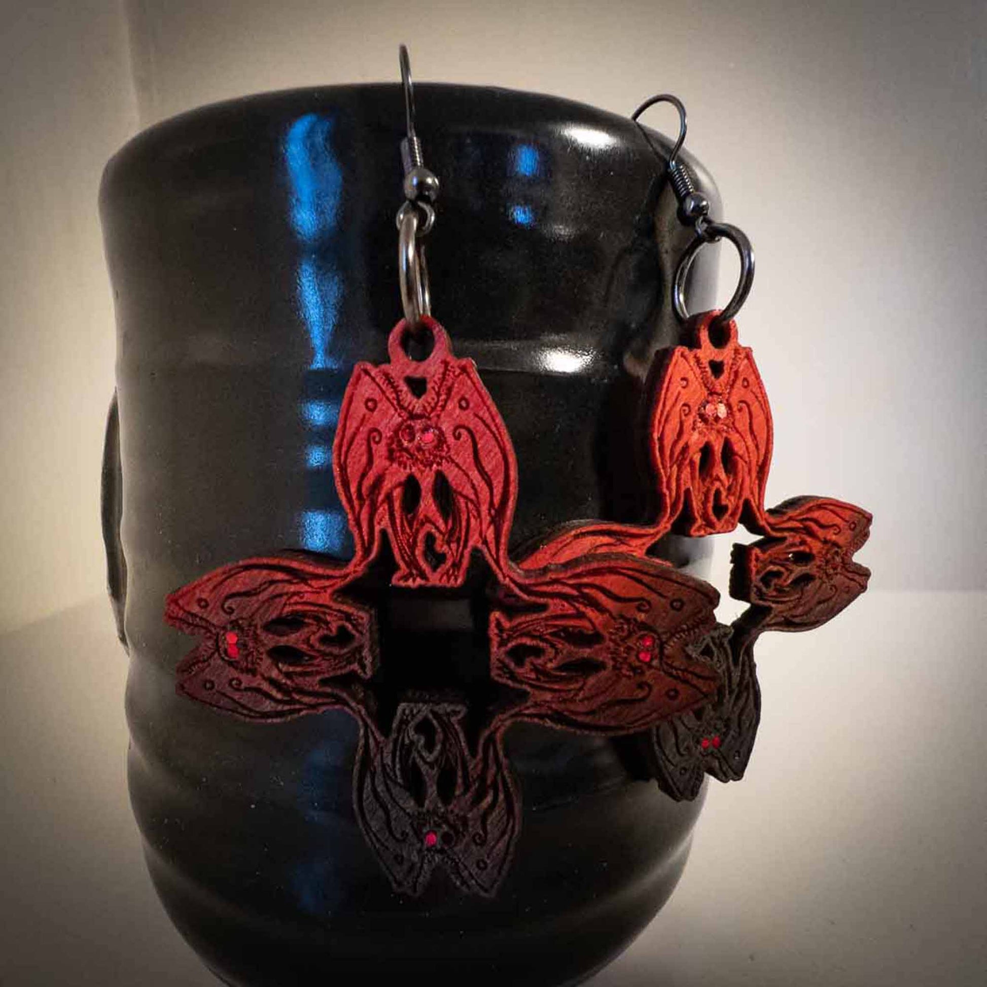 Mothman Cryptid Earrings; dyed; ombre; red Black; mothman pattern earrings; Melasdesign Handmade Darkness; Cryptid Collection; cryptid earrings; Mothman earrings; Mothman jewelry; made in West Virginia