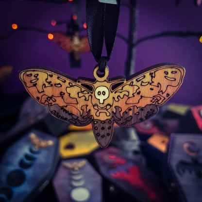 Deaths Head Moth Ornament in Colorful Wood; Melasdesign Handmade; Thomas WV; hanging decor; ornament; moth; deaths head moth; wood; small business; witchy decor; gothic decor; art and decor collection; Halloween decor