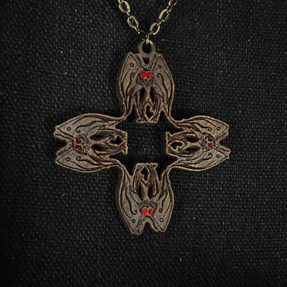 Mothman Necklace in Black Cryptid Cross Pattern; mothman; necklace; pendant; jewelry; handmade; Melasdesign Handmade; alternative; cryptid core; cryptid collection; cryptids; West Virginia; Point Pleasant