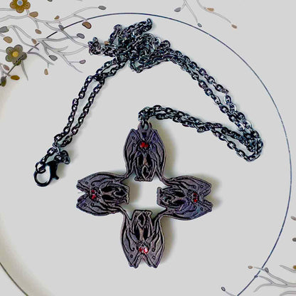 Mothman Necklace in Black Cryptid Cross Pattern