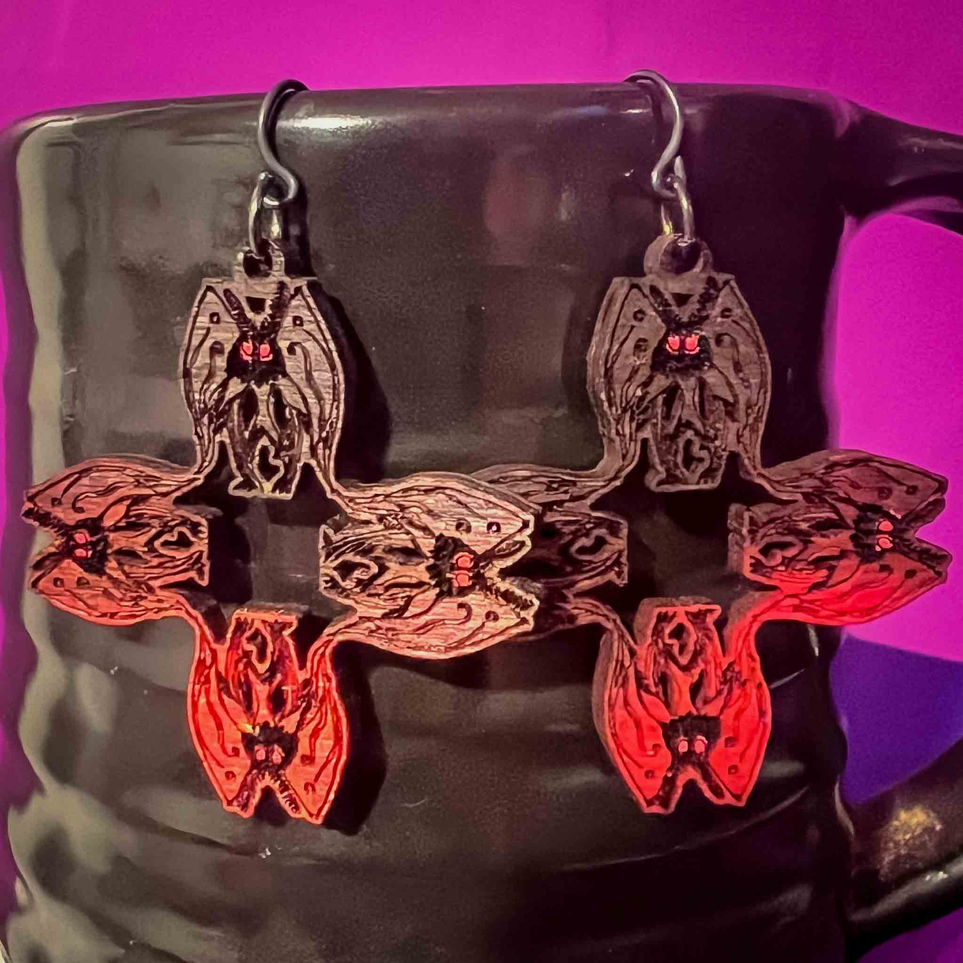 cryptid earrings; cryptid jewelry; west virginia cryptids; mothman; point pleasant
