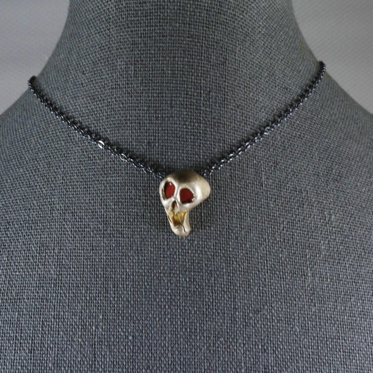 Handmade necklace - fine silver jewelry; screaming skull with red eyes necklace; small skull pendant; skull with red enamel eyes; Susan Hicks; Melasdesign Handmade Shop; Halloween jewelry; goth prom; gothic outfit