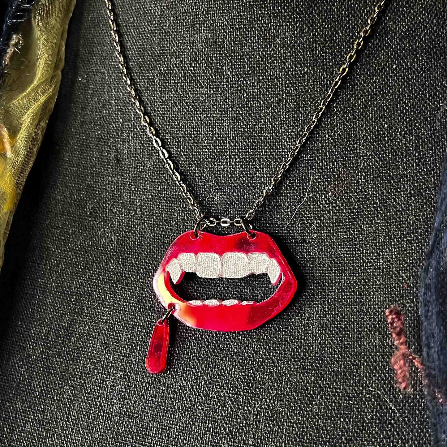 vampire mouth necklace; vampire mouth pendant; vampire necklace; vampire mouth jewelry; golden bronze chain; melasdesign handmade darkness; gothic; Halloween; vamp; goth; peculiar jewelry