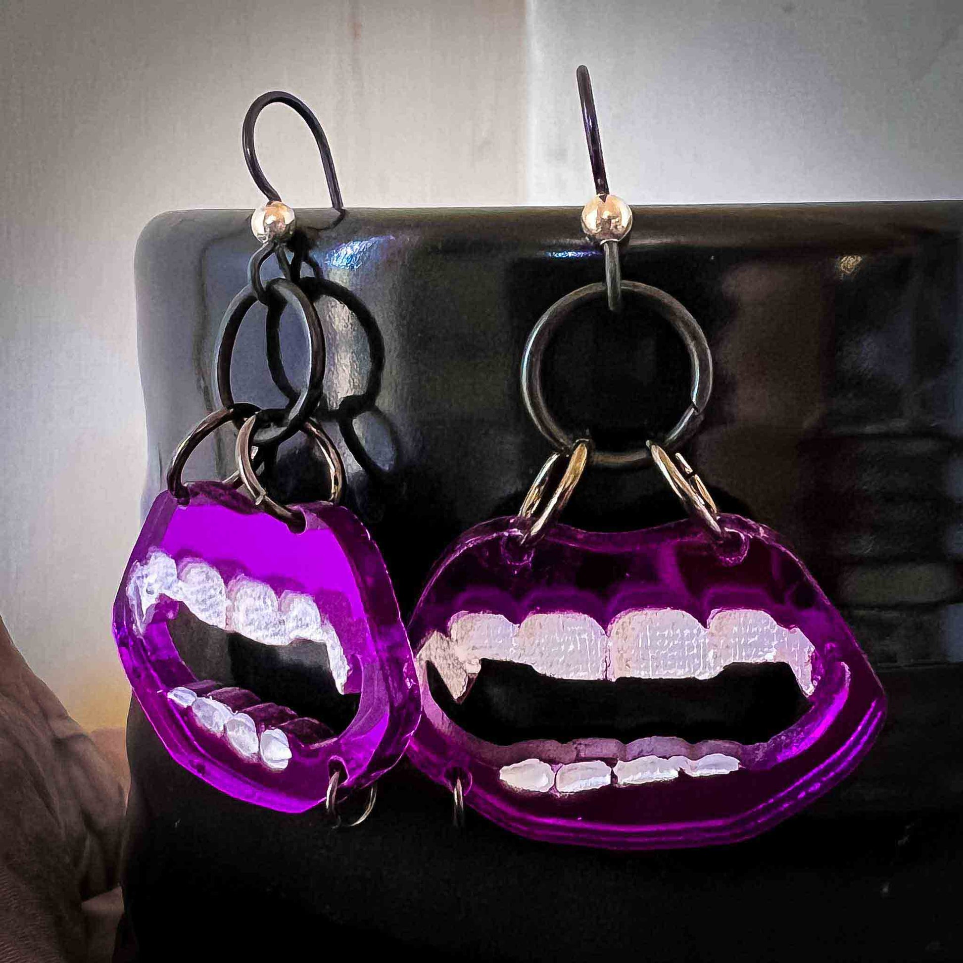 gothic; earrings; jewelry; biting vampire mouth; 